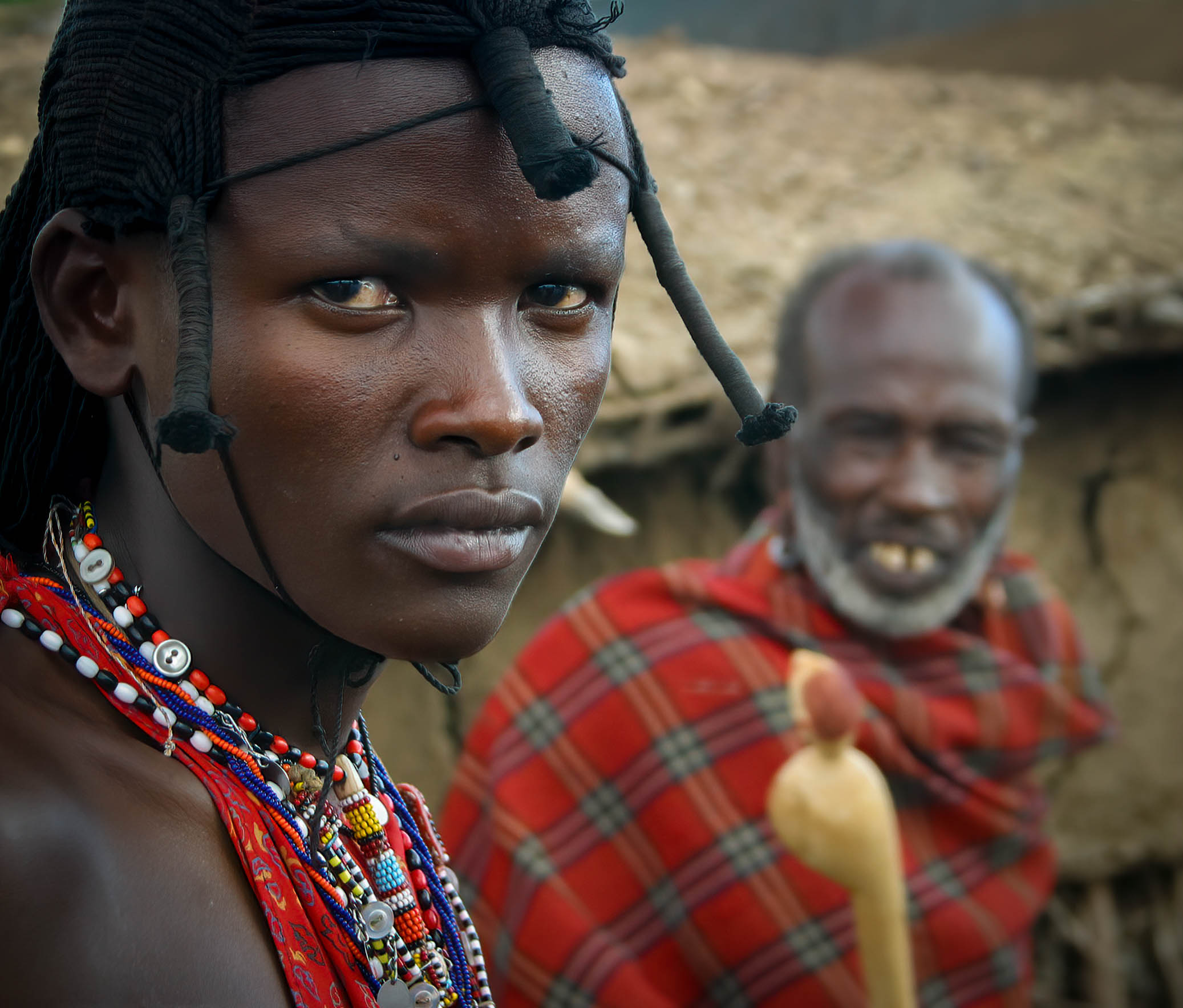 Two Maasai men, one in the foreground, Tanzania