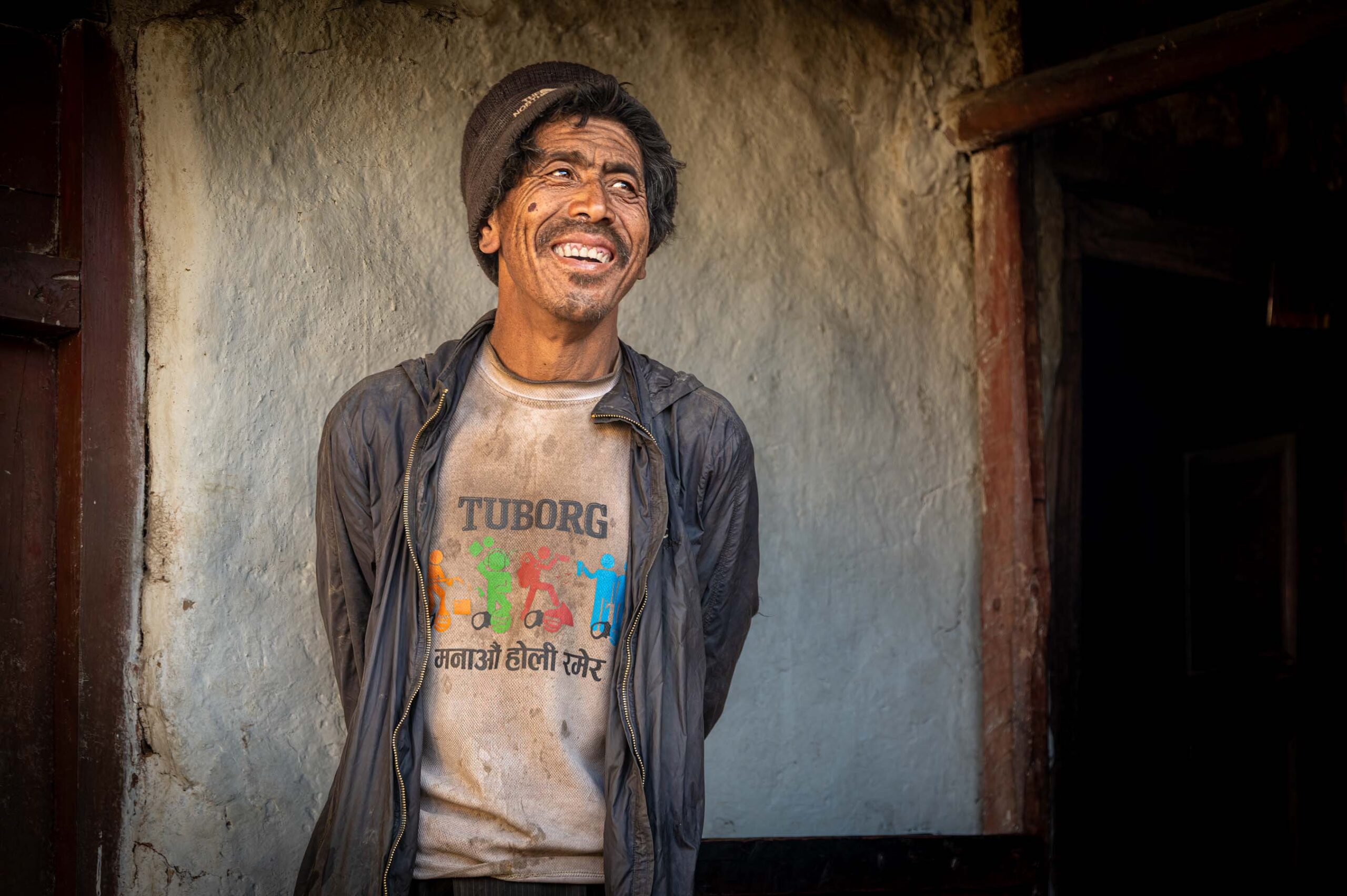 Man standing in a doorway, Mustang, Nepal